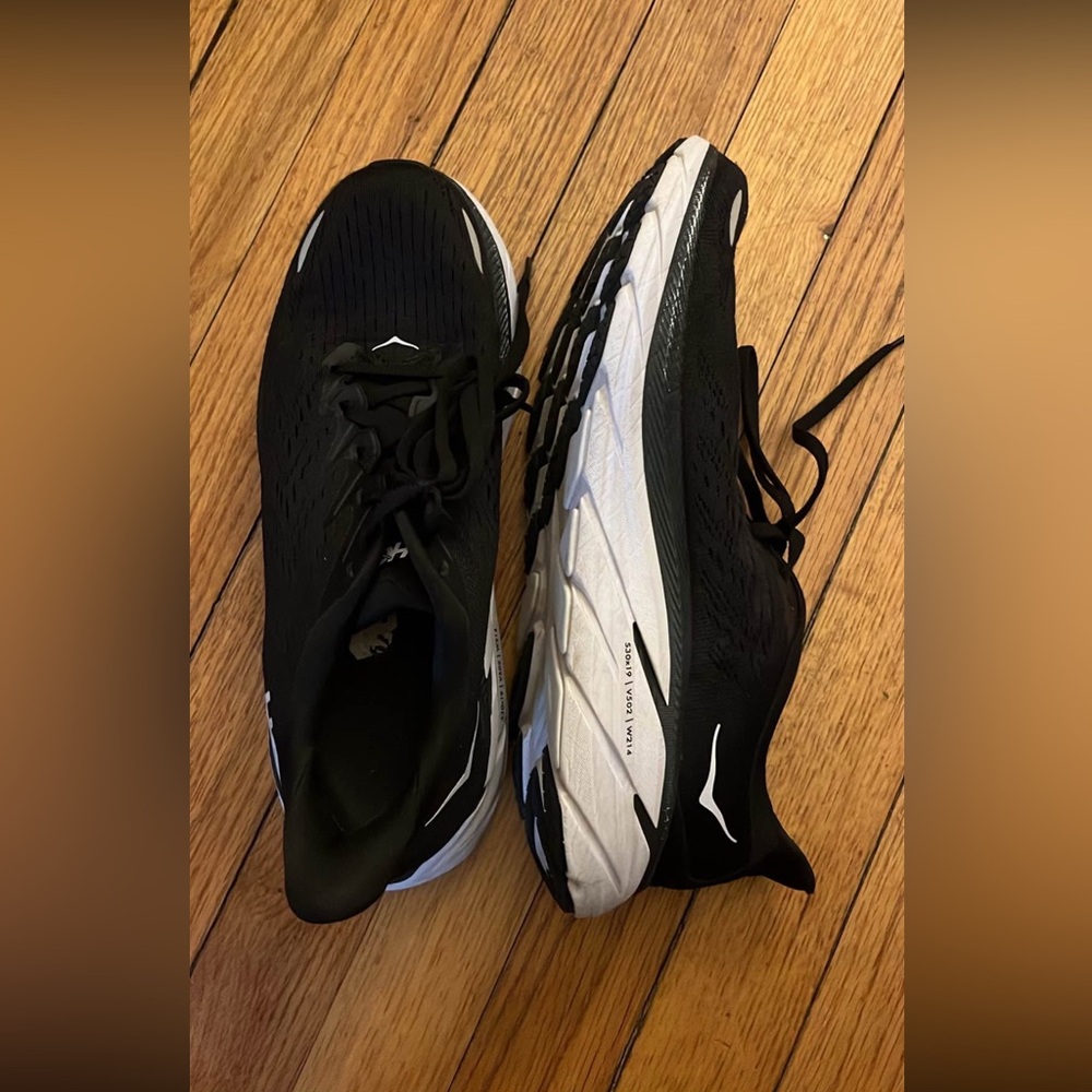 Black and White Hoka running shoes